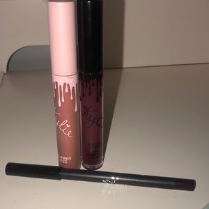 One Kylie lipgloss and one Kylie kit